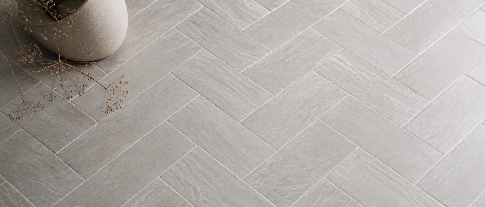 Herringbone wood flooring in a finished interior