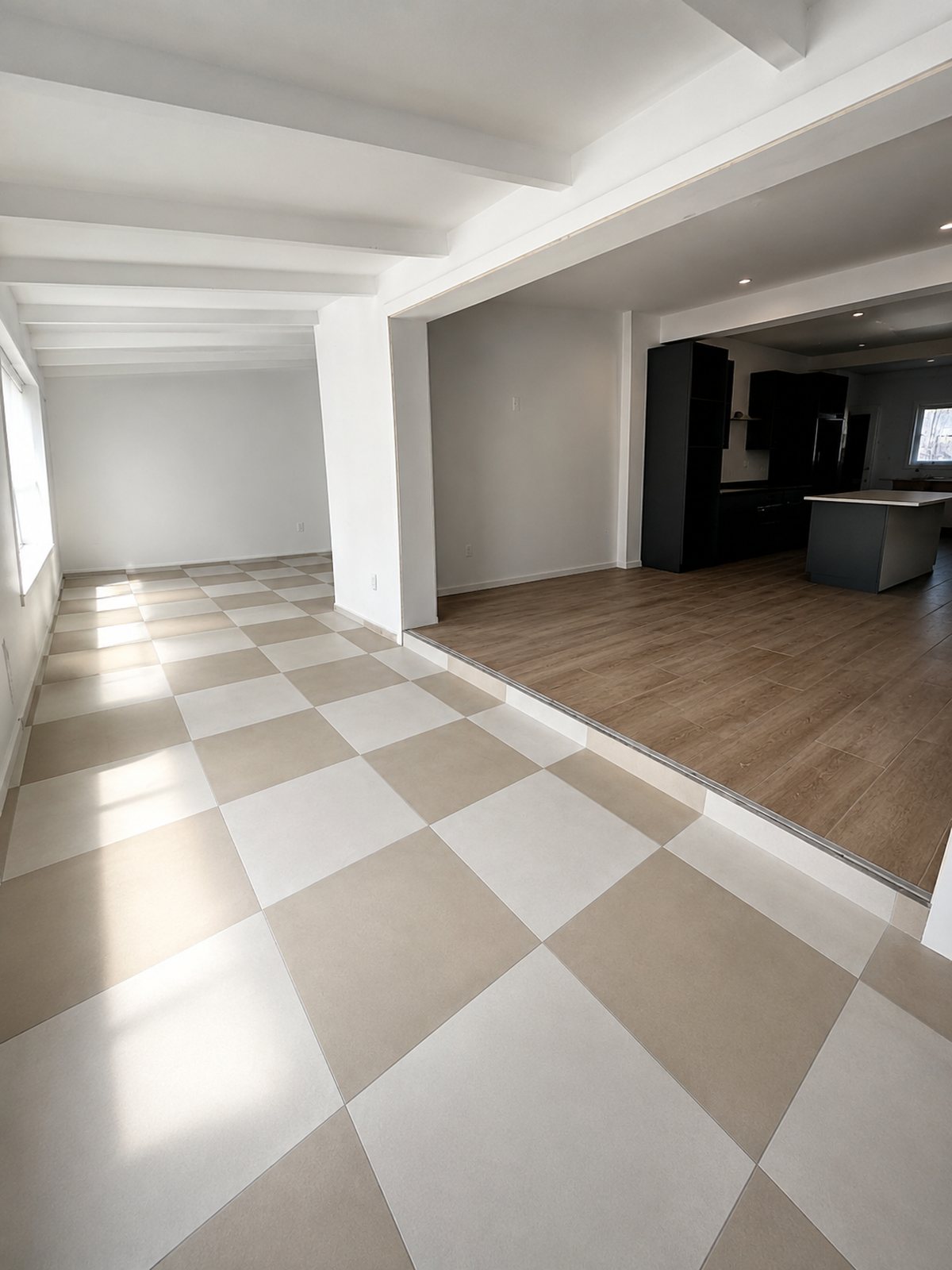Open-plan room with checkerboard porcelain tile meeting wood-look plank